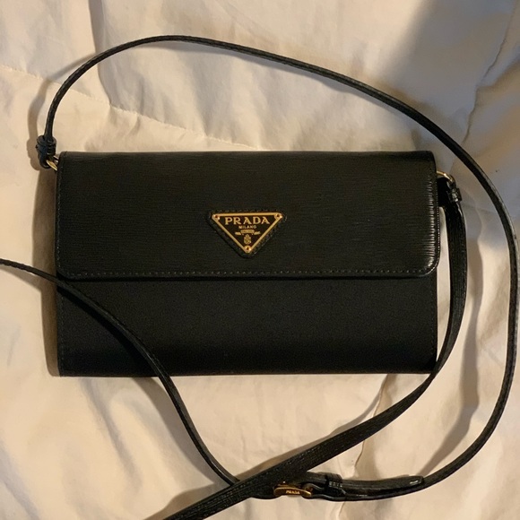 Prada Handbags - Prada black wallet on strap saffiano/nylon